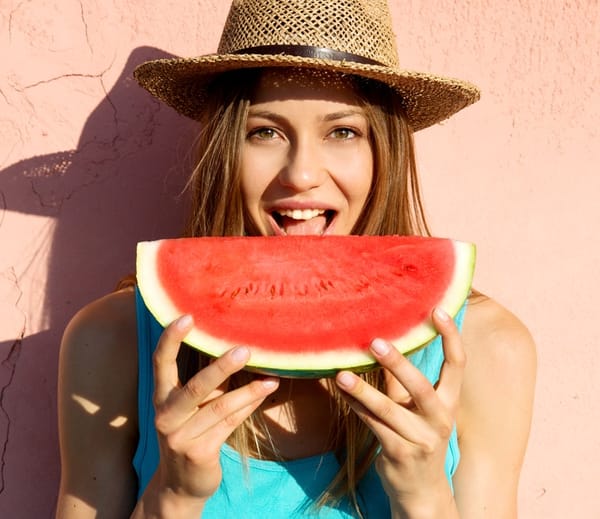 Beautiful woman having watermelon